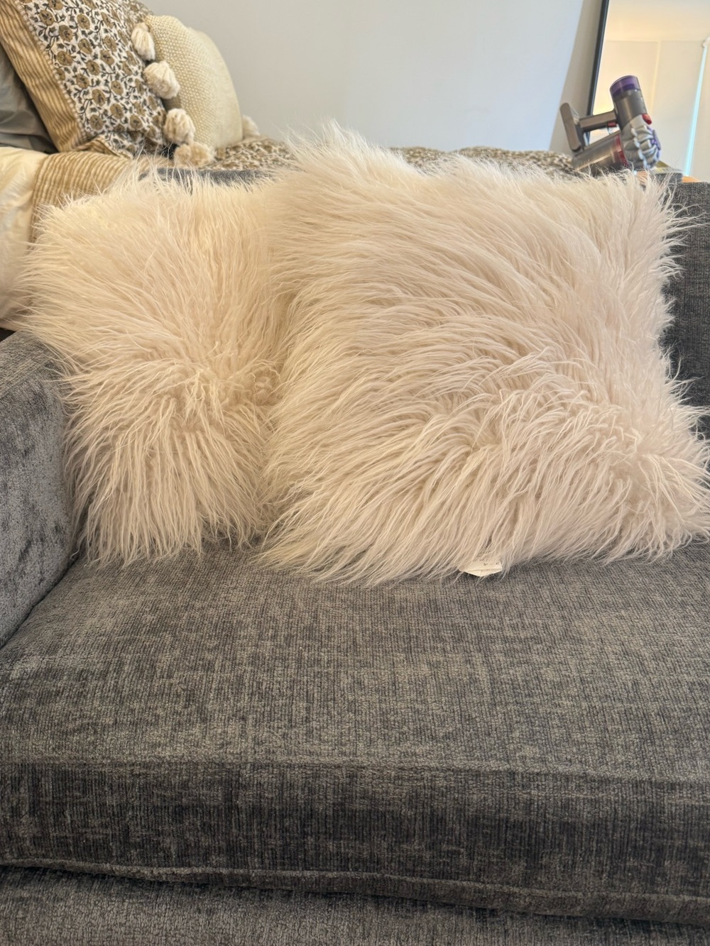 Crate & Barrel Aja White Mongolian Faux Fur Throw Pillows